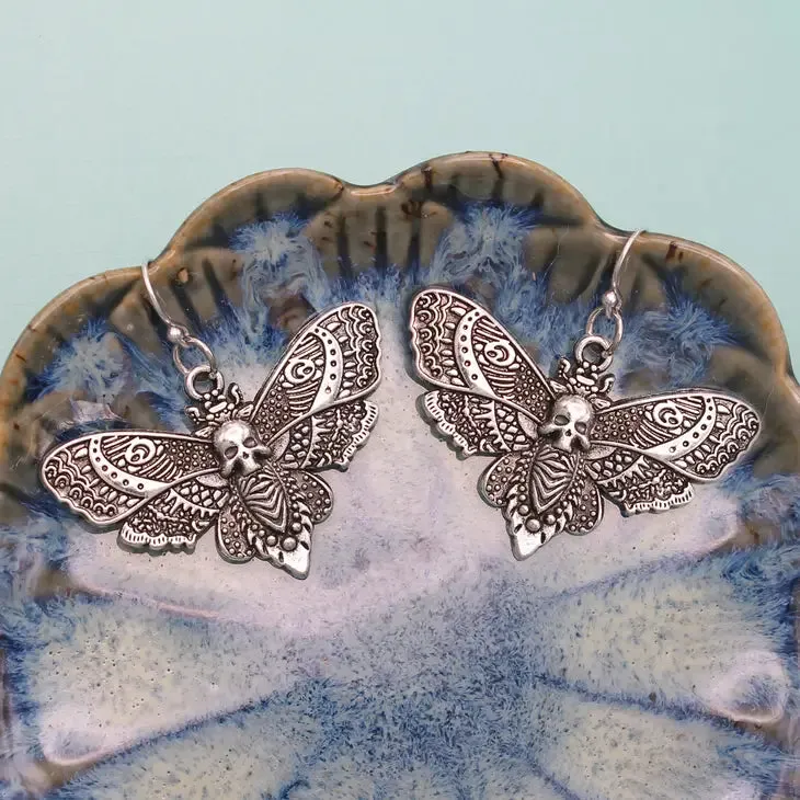 Silver Deaths Head Moth Earrings sold by Sunbeam