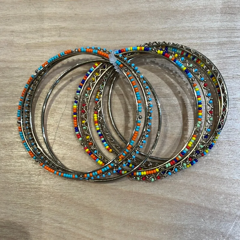 8 Piece Beaded Bangle Bracelet sold by Sunbeam