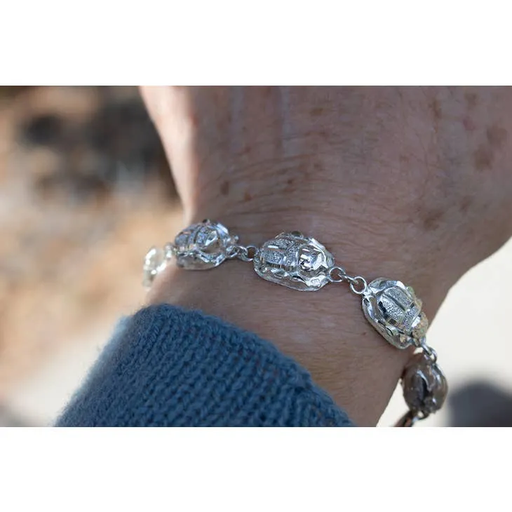 Sterling Silver Scarab Link Bracelet sold by Sunbeam