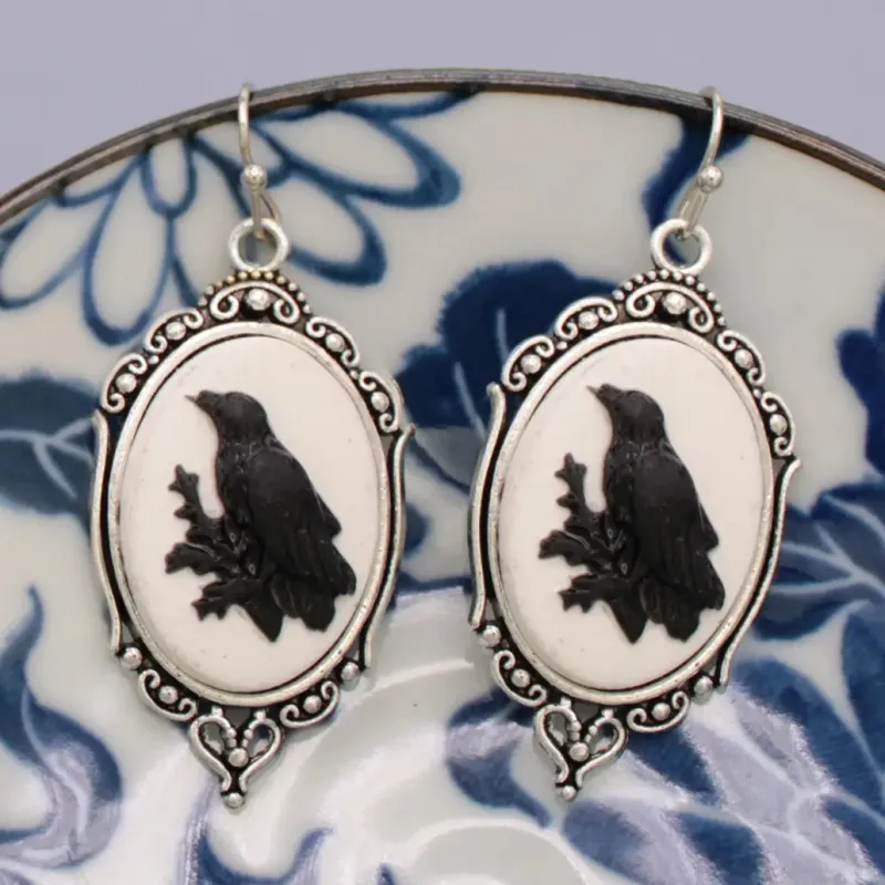 Regal Raven Silver Cameo Earrings sold by Sunbeam