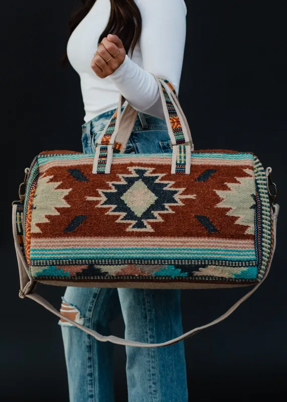 Rust, Green, & Cream Aztec Duffel sold by Sunbeam