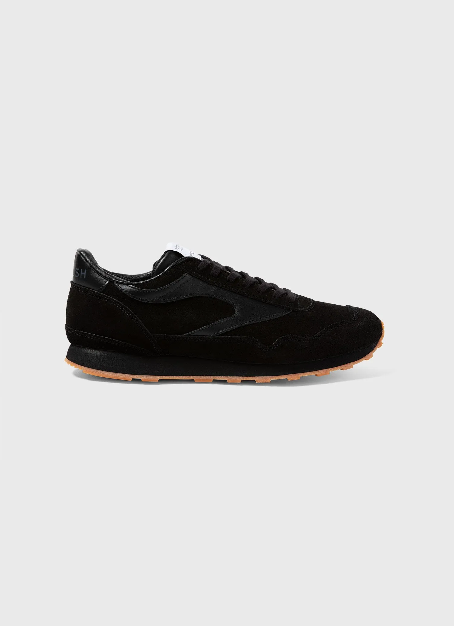 Walsh Trainer in Black sold by Sunspel