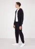 Men's Merino Wool Lounge Pant in Navy sold by Sunspel