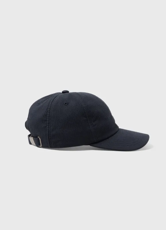 Seersucker Cap in Navy sold by Sunspel