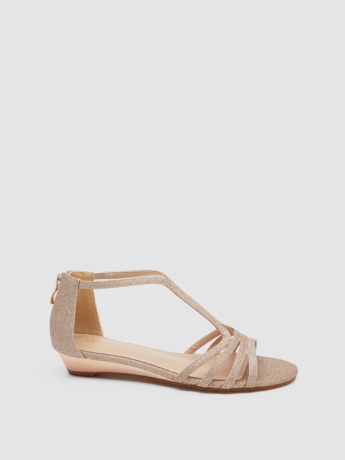 Fine Glitter Round Toe T-Strap Wedge Sandal sold by Suzy Shier