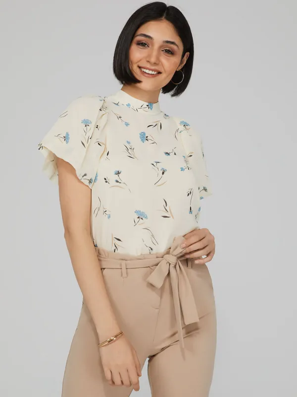 Printed Mock Neck Blouse With Open Back sold by Suzy Shier