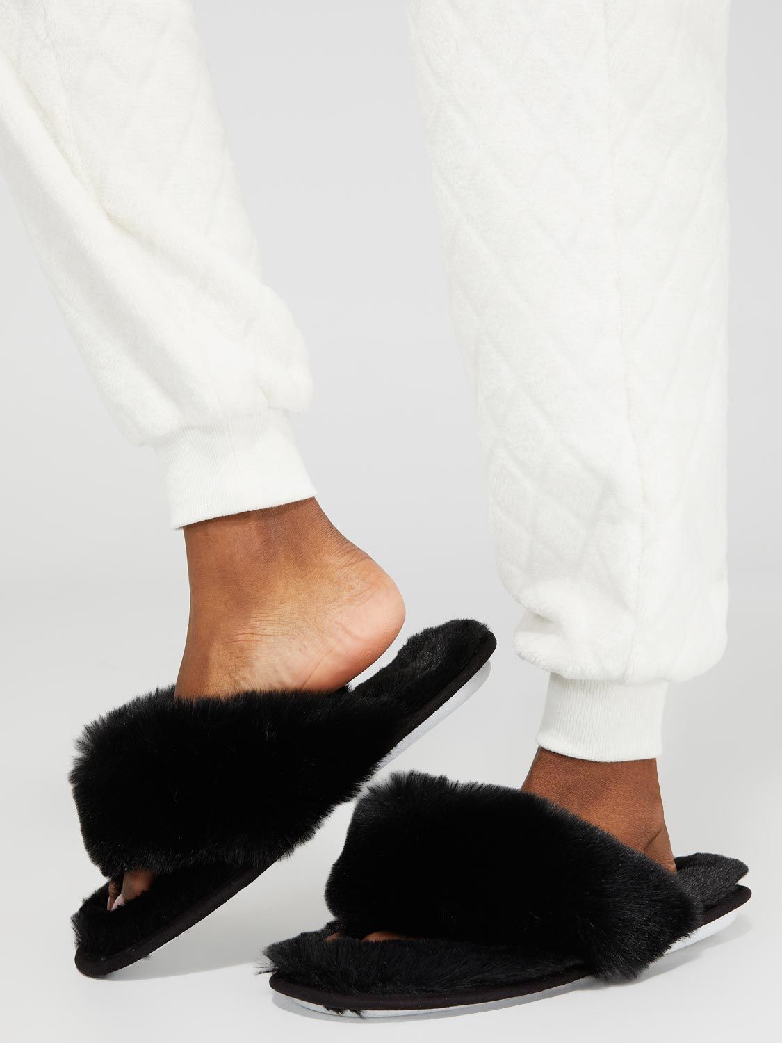 Faux Fur Flip-Flop Slippers sold by Suzy Shier