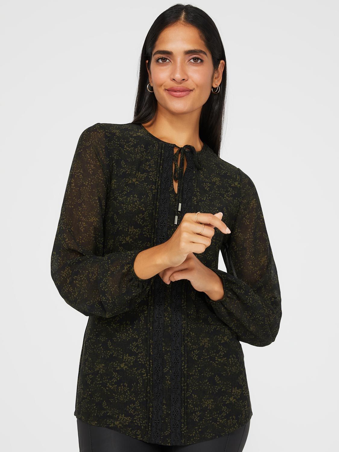 Long Chiffon Floral Print Top With Front Keyhole sold by Suzy Shier