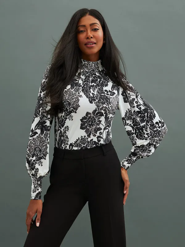 Printed Balloon Sleeve Mock Neck Top With Rhinestone Detail sold by Suzy Shier