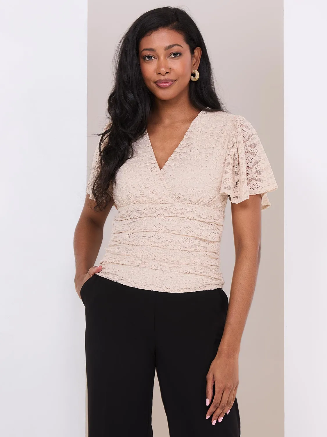 Lace Cross-Front Top With Flutter Sleeves sold by Suzy Shier