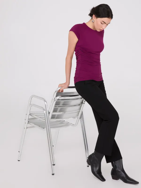 Short Raglan Sleeve Top With Side Pleats sold by Suzy Shier