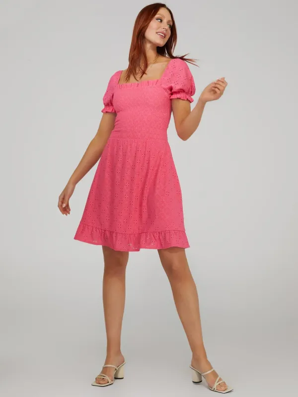 Smocked Eyelet Mini Dress With Puff Sleeves sold by Suzy Shier
