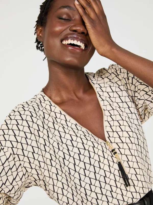 Geo Print Zip Front V-Neck Top sold by Suzy Shier