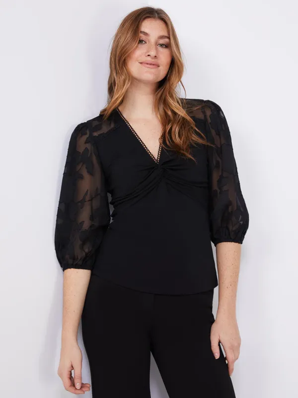 Knotted V-Neck Top With Jacquard Sleeves sold by Suzy Shier