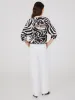 Animal Print Satin Dolman Sleeve Top sold by Suzy Shier