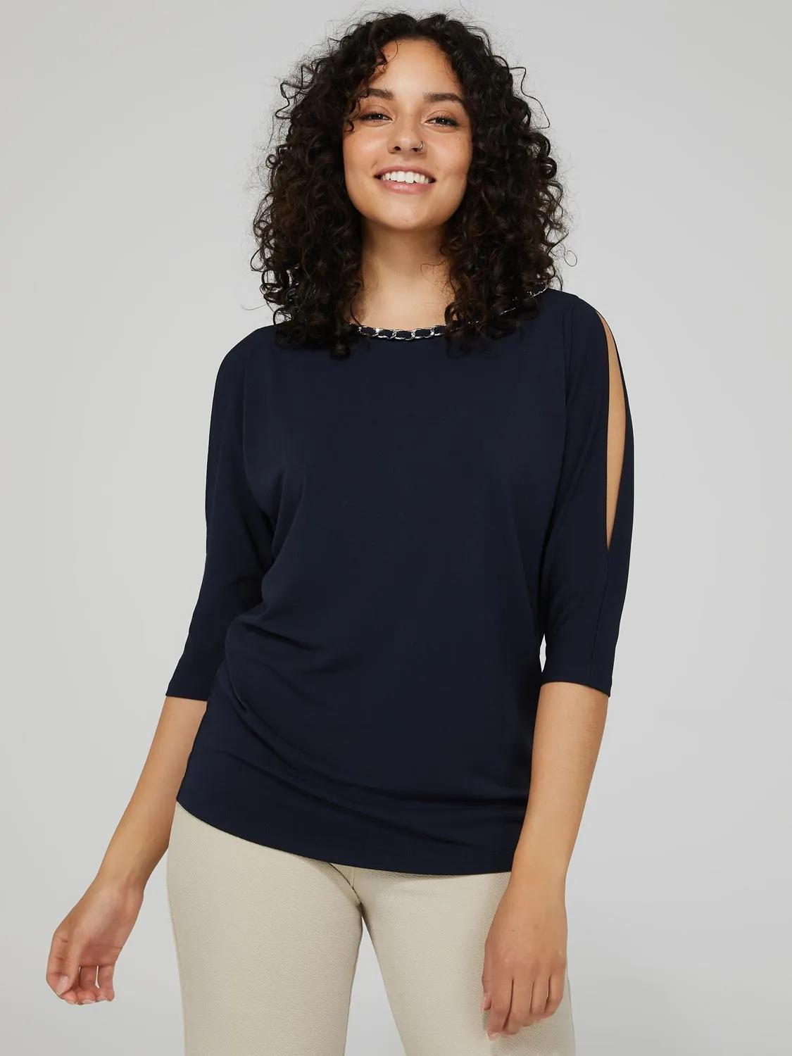 Cold Shoulder Top With Chain Neckline Detail sold by Suzy Shier