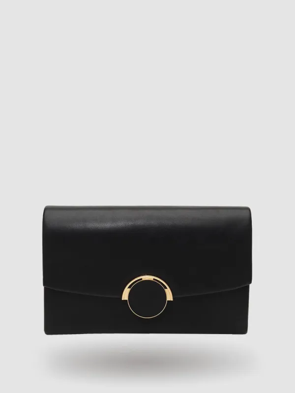 Patent Faux-Leather Flapover Clutch With Metal Closure sold by Suzy Shier