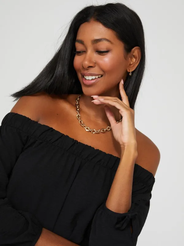 Textured Off-The-Shoulder Top With 3/4 Sleeves sold by Suzy Shier