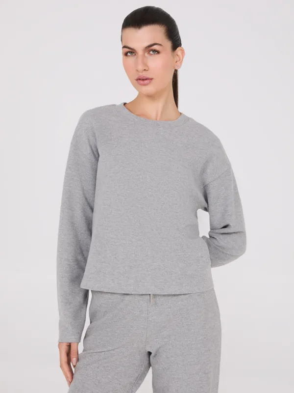 Melange Brushed Ribbed Loose Sweatshirt sold by Suzy Shier