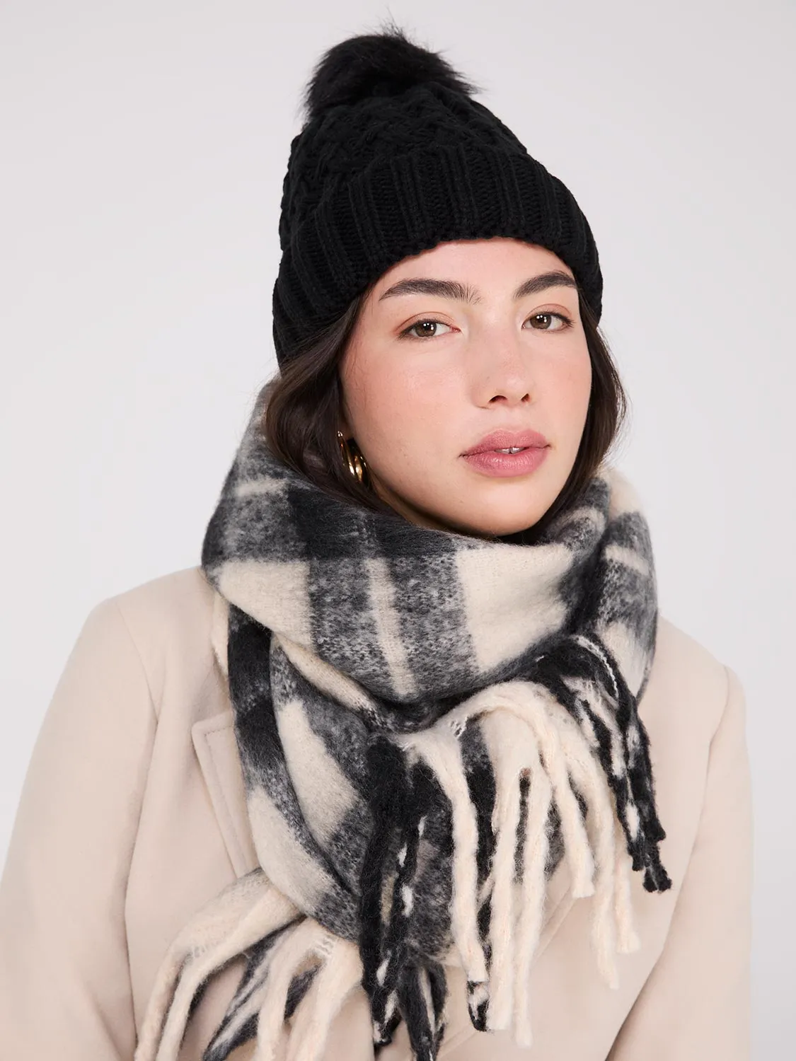 Cable Knit Hat With Faux Fur Pom Pom sold by Suzy Shier