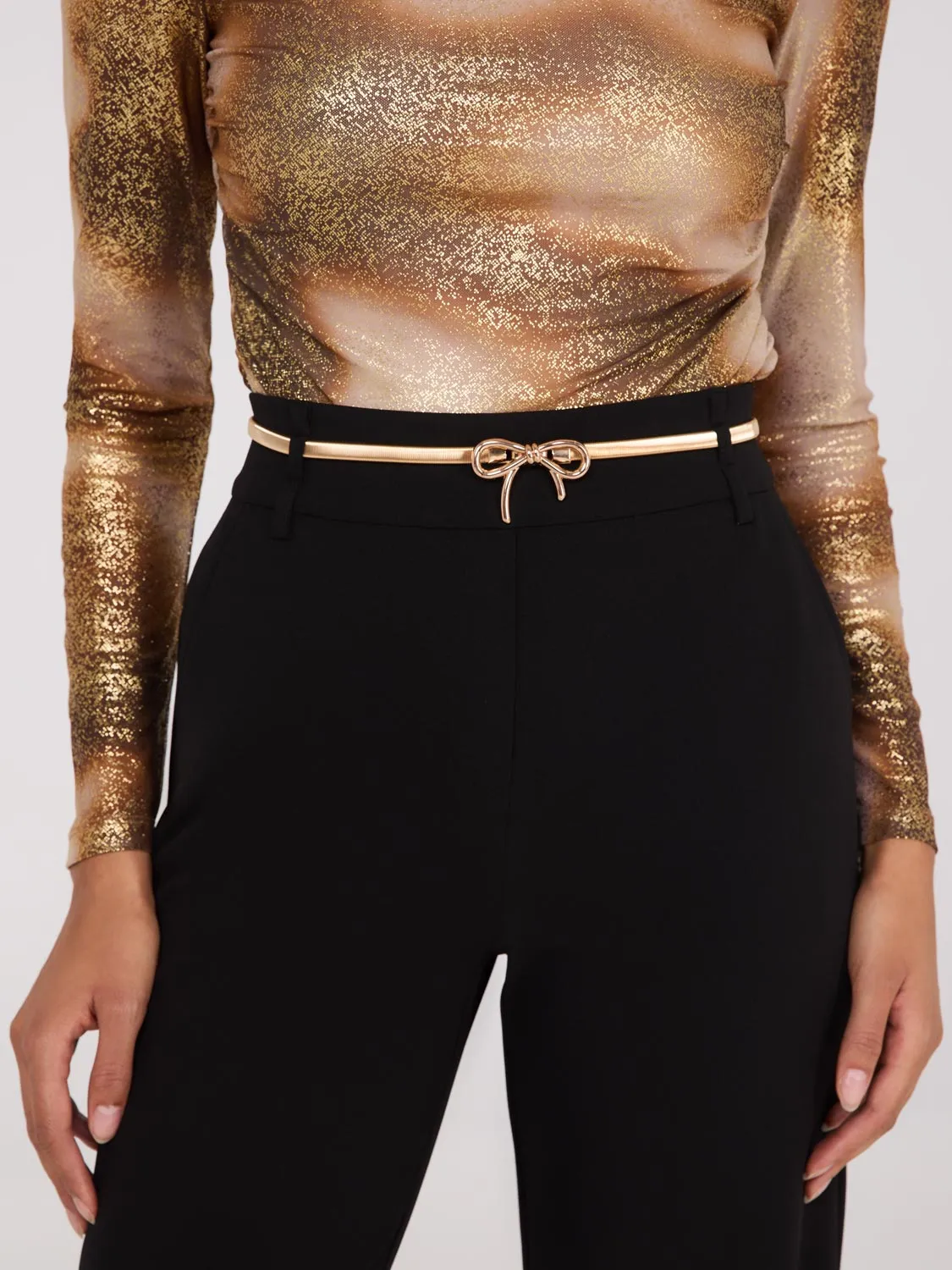 Gold Metal Bow Belt sold by Suzy Shier