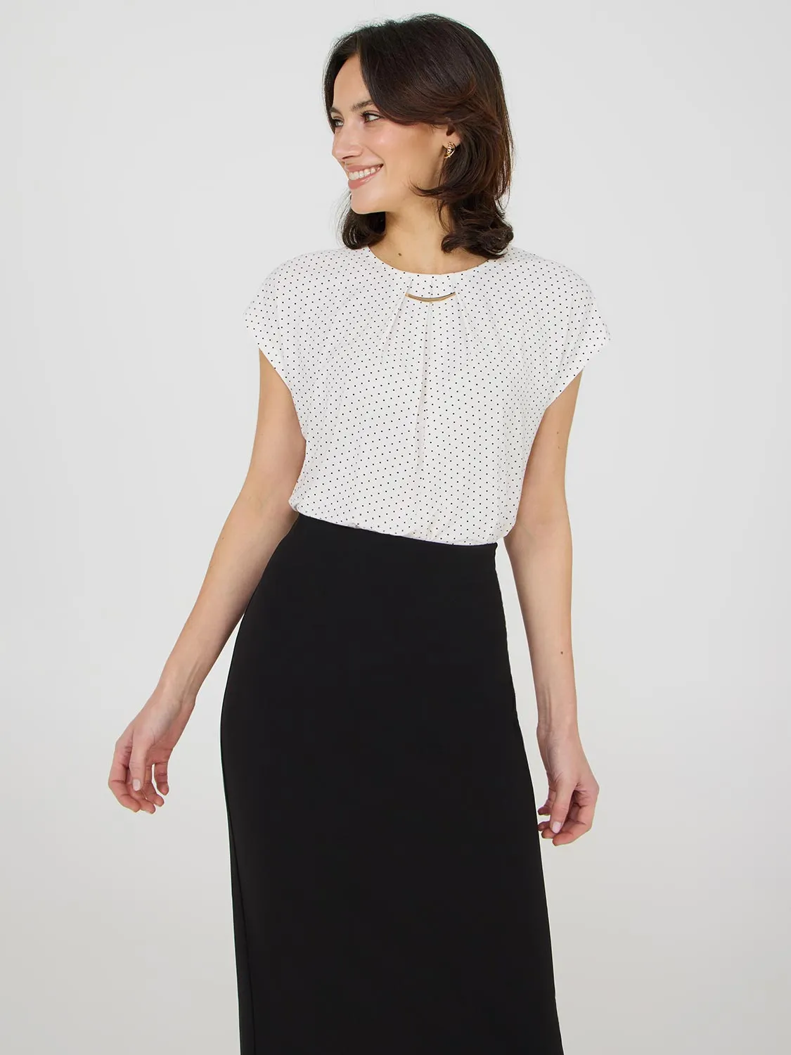 Dot Print Pleated Top With Bar Detail sold by Suzy Shier