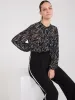 Printed Ruffle Button-Front Blouse sold by Suzy Shier