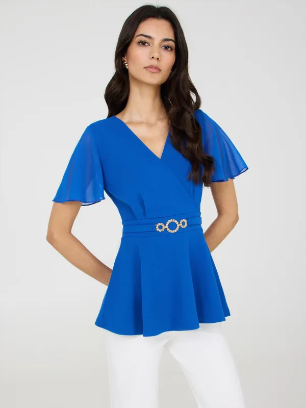 Crossover Peplum Top With Metal Belt sold by Suzy Shier