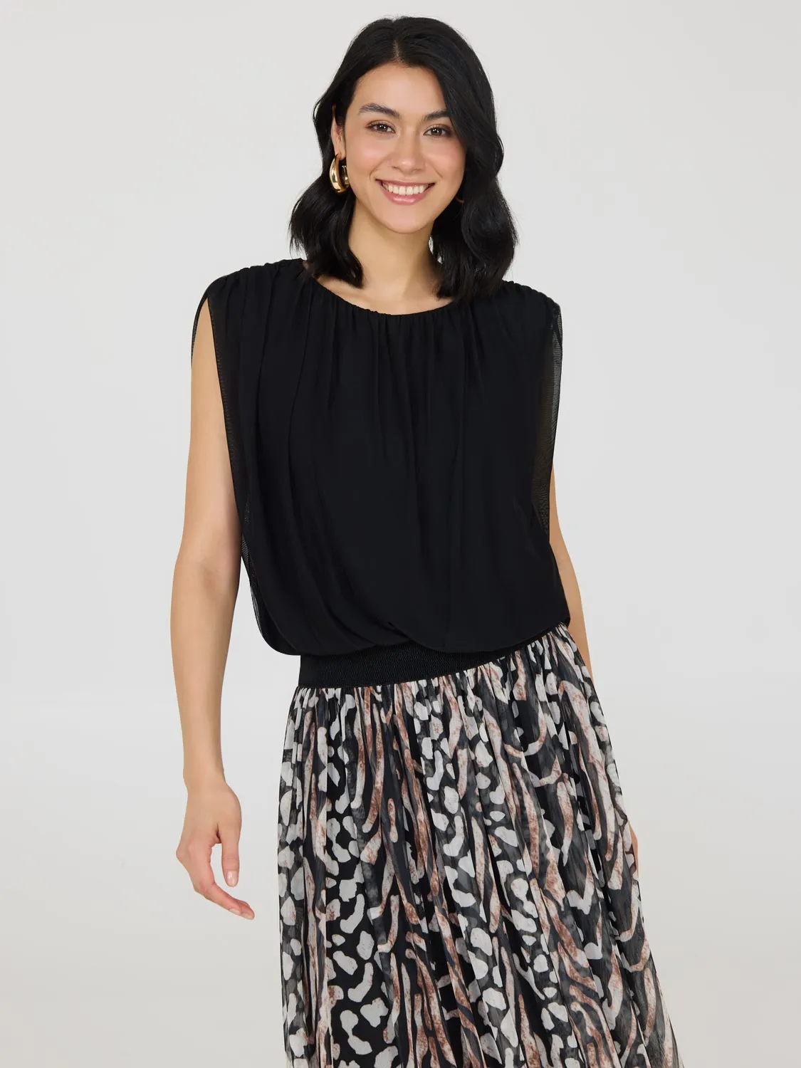 Sleeveless Bubble Hem Top sold by Suzy Shier