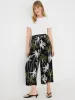 Tropical Print Wide-Leg Gaucho Pants sold by Suzy Shier
