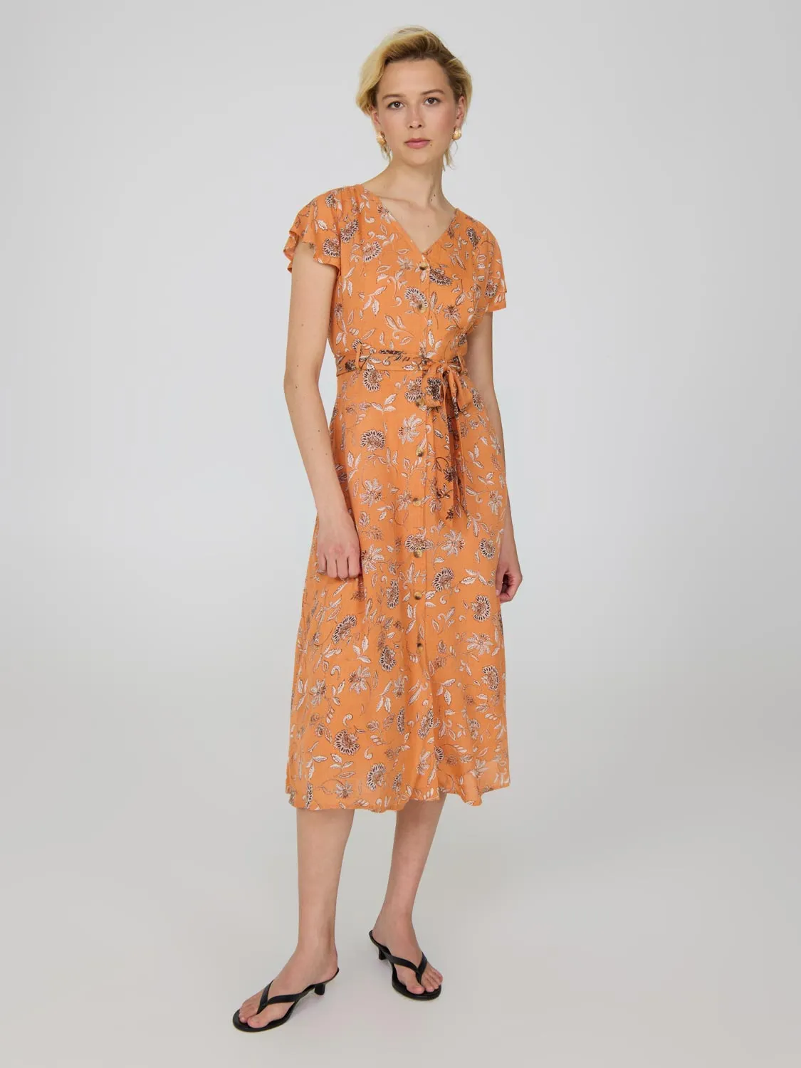 Printed Flutter Sleeve Button-Front Midi Dress sold by Suzy Shier