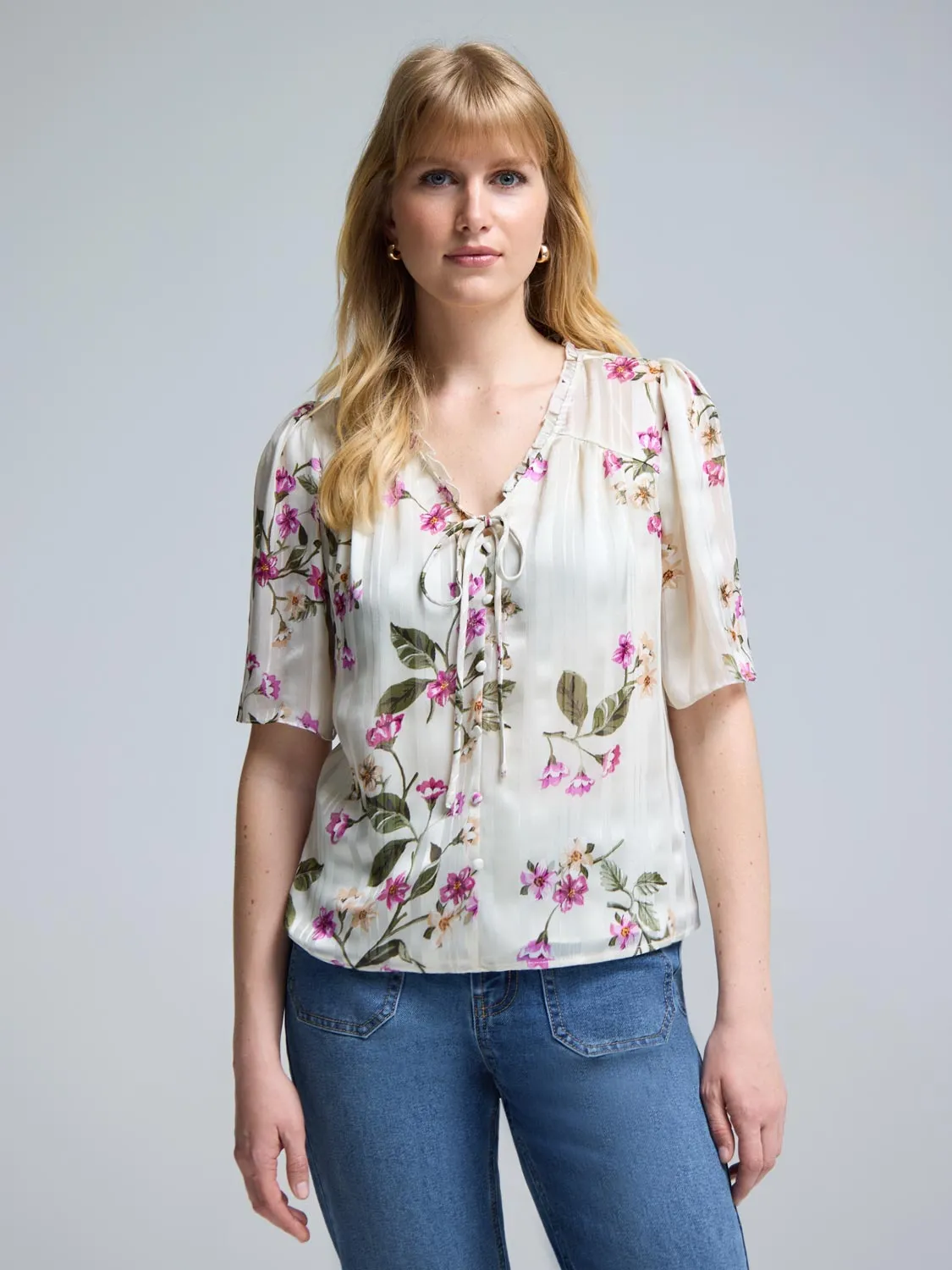 Floral Flutter Sleeve Top sold by Suzy Shier