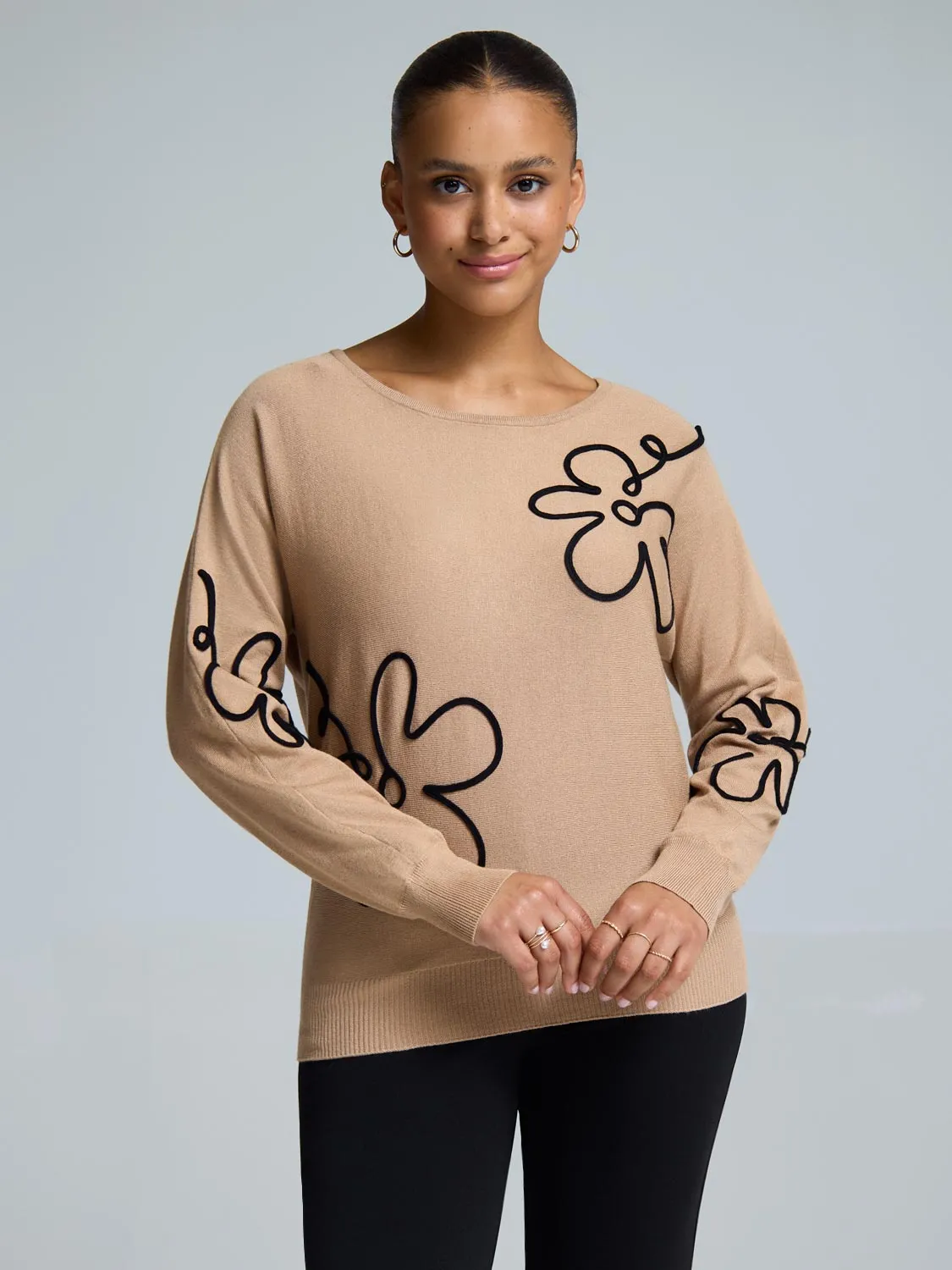 Knit Sweater With Floral Design sold by Suzy Shier