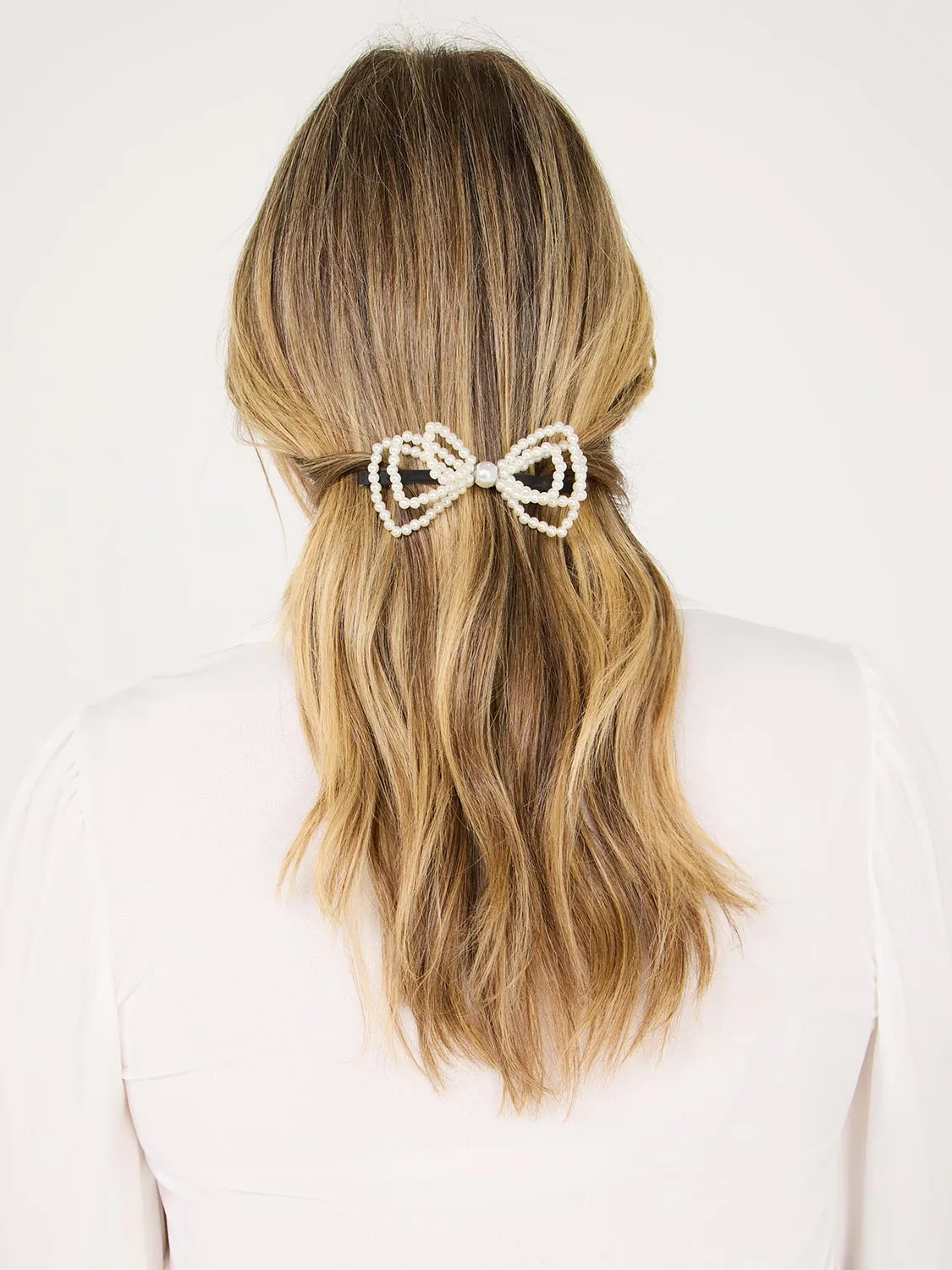 Pearl Bow Hair Clip sold by Suzy Shier