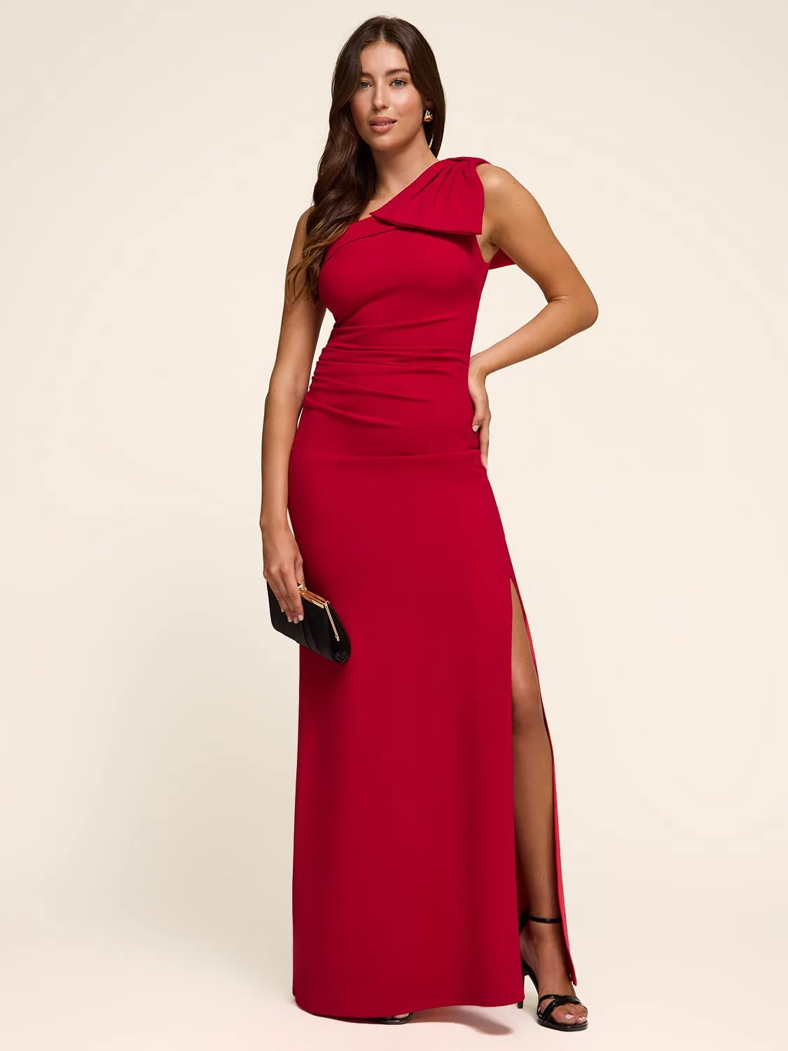 One-Shoulder Gown With Statement Bow sold by Suzy Shier