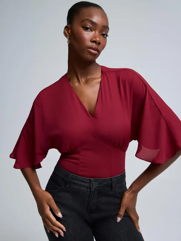 Embellished V-Neck Dolman Sleeve Chiffon Top sold by Suzy Shier