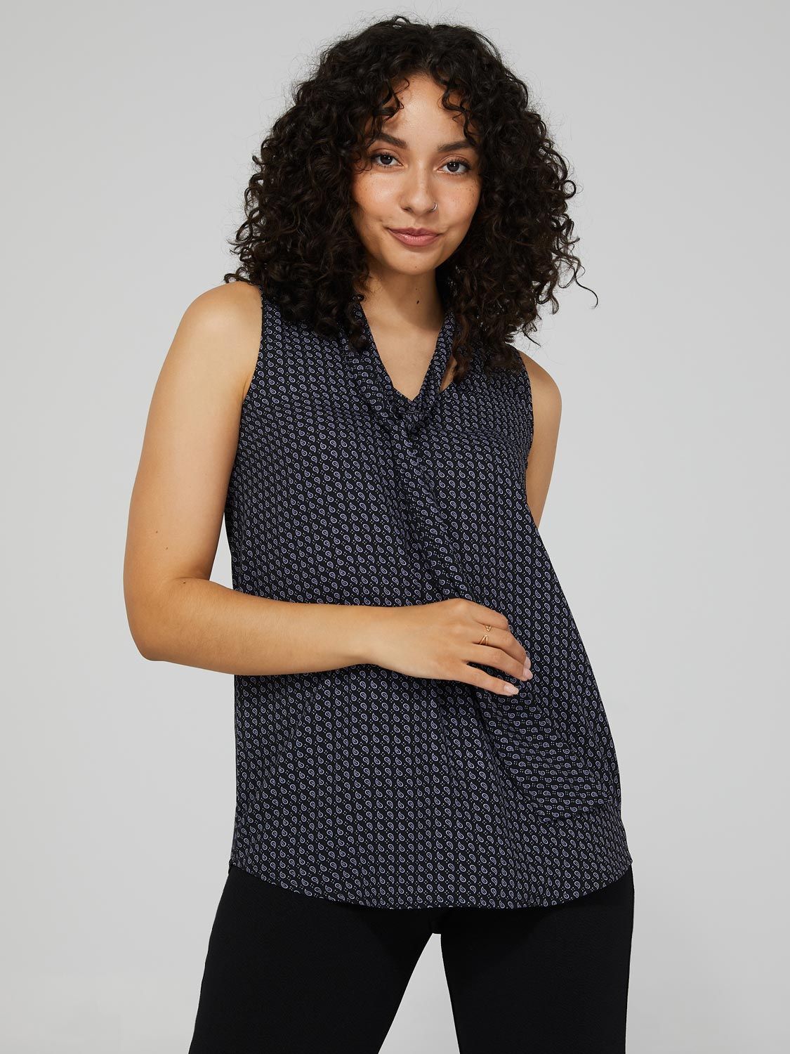 Printed Sleeveless Chiffon V-Neck Top With Tie sold by Suzy Shier