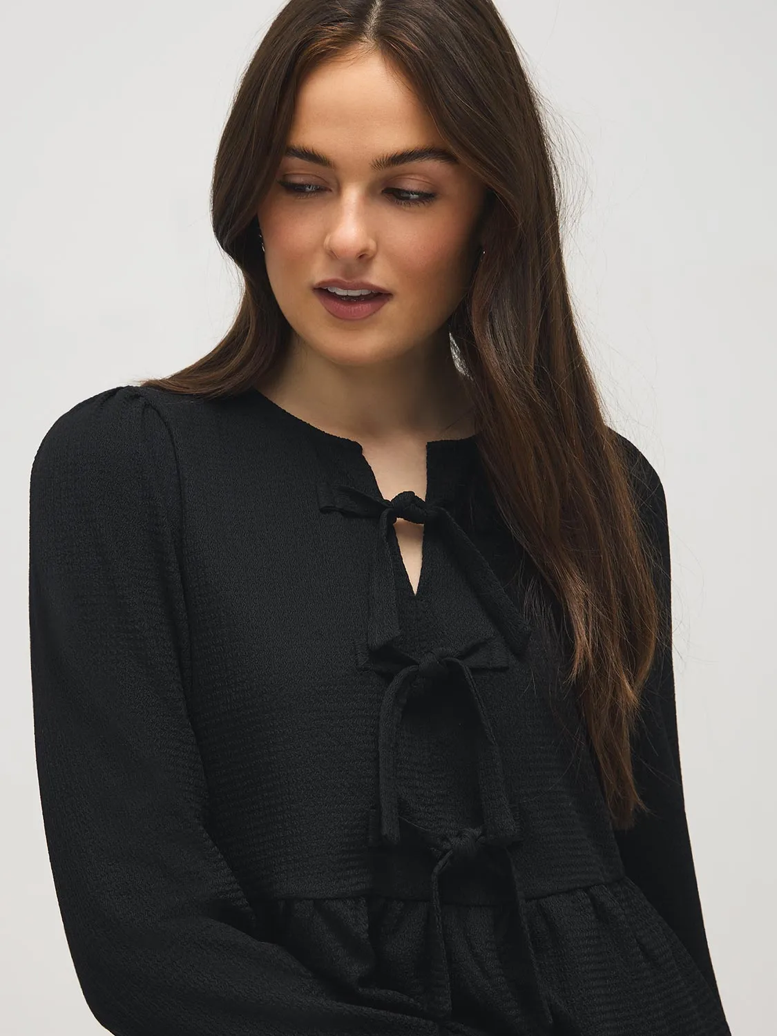 Bow Detail Peplum Top sold by Suzy Shier