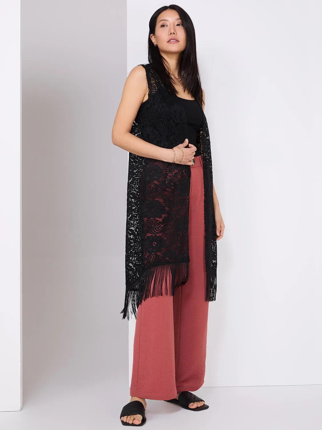 Sleeveless Lace Duster With Fringe Bottom sold by Suzy Shier