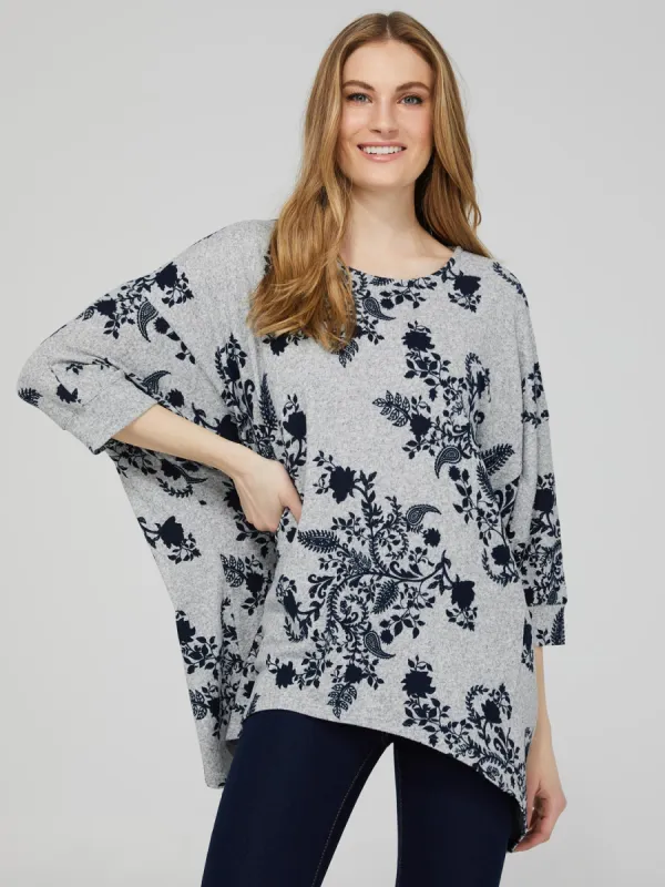 Printed 3/4 Dolman Sleeve Top With Handkerchief Hem sold by Suzy Shier