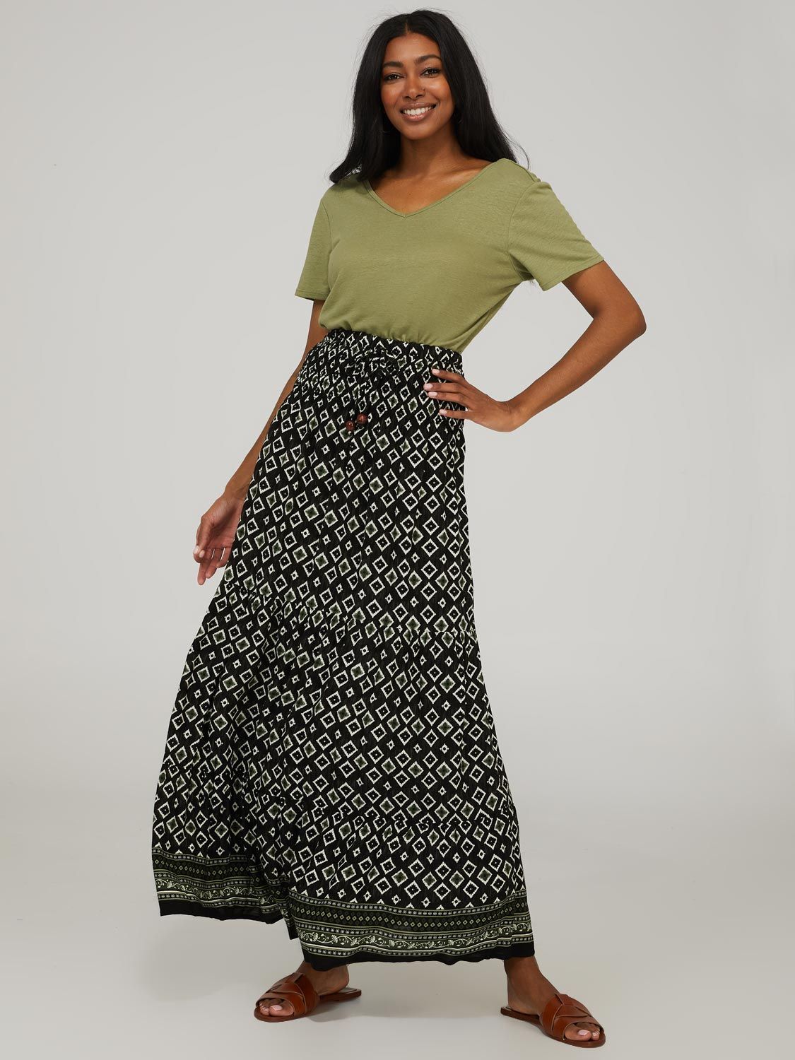 Abstract 3-Tier Printed Smocked Maxi Skirt sold by Suzy Shier