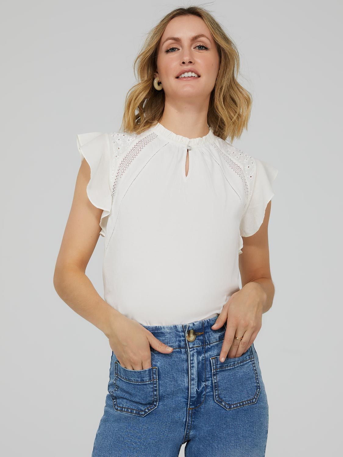 Ruffle Embroidered Top With Keyhole Front sold by Suzy Shier