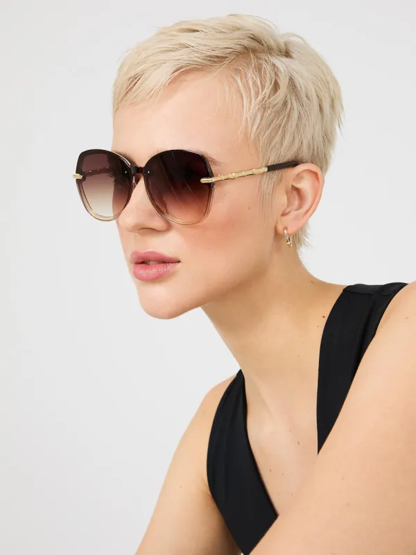 Clear Frame Round Sunglasses With Gold Details made by Suzy Shier
