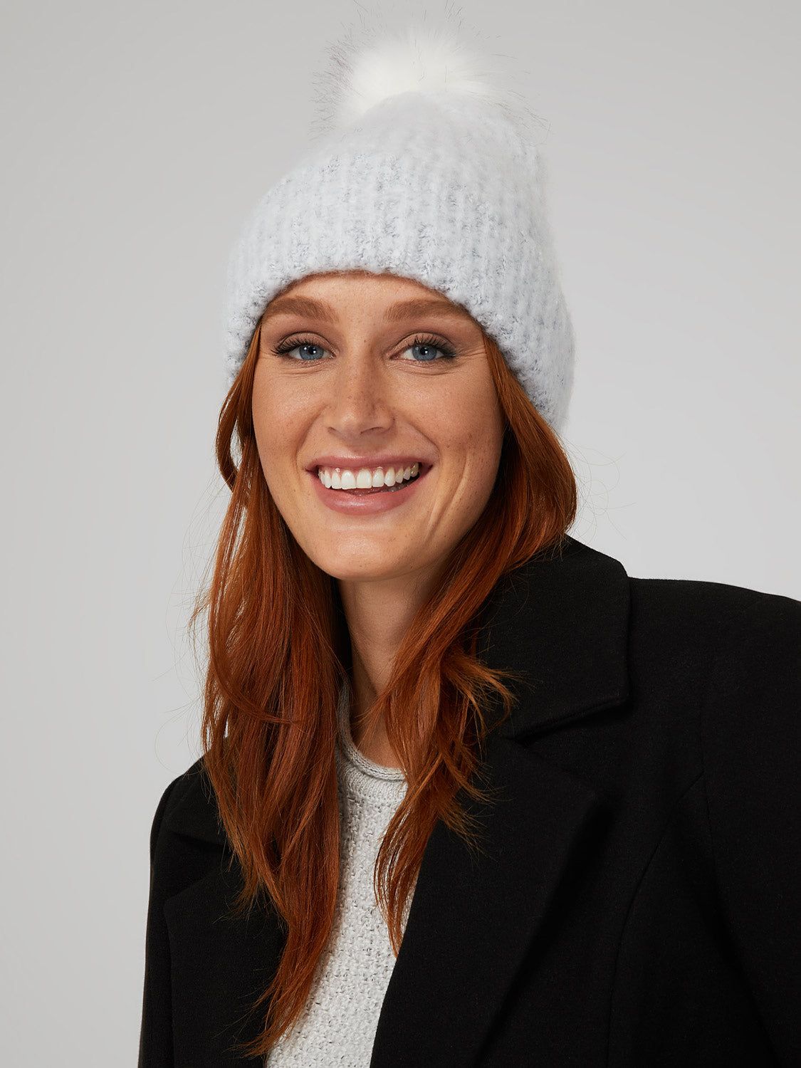Fuzzy Knit Hat With Faux Fur Pom Pom sold by Suzy Shier