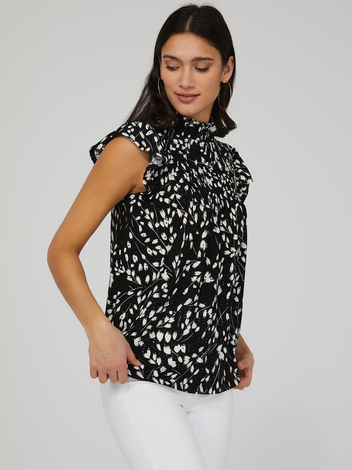 Printed Eyelet Mock Neck Top sold by Suzy Shier