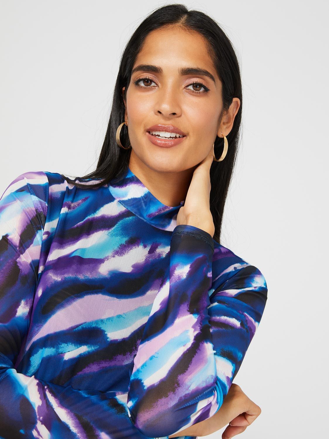 Printed Mock Neck Mesh Top sold by Suzy Shier