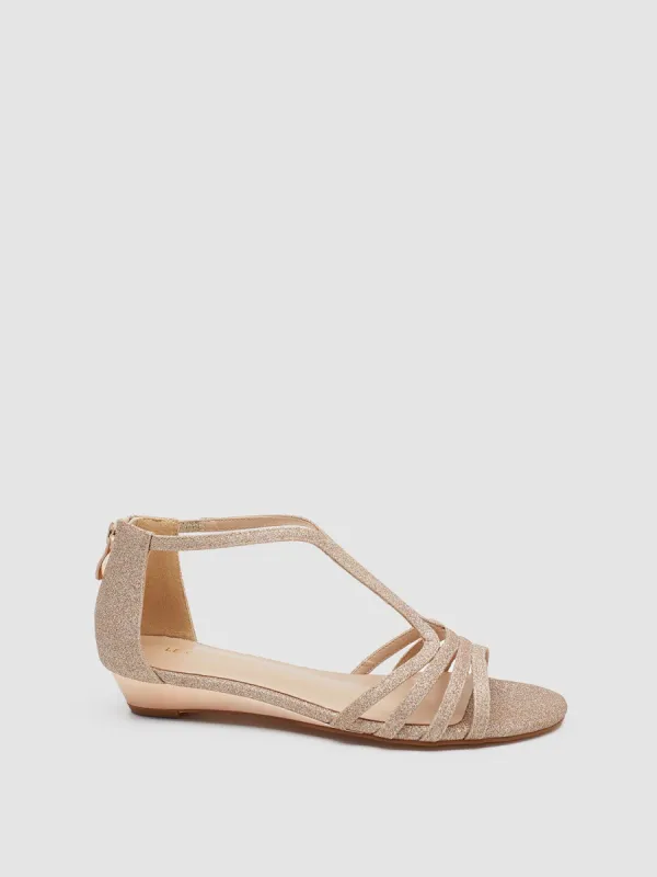 Fine Glitter Round Toe T-Strap Wedge Sandal sold by Suzy Shier