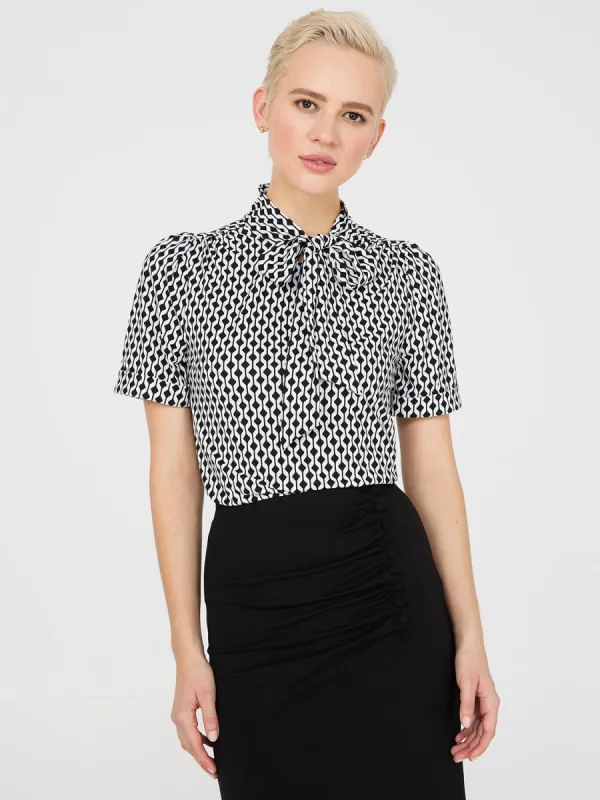 Geo Print Short Sleeve Tie-Neck Top sold by Suzy Shier