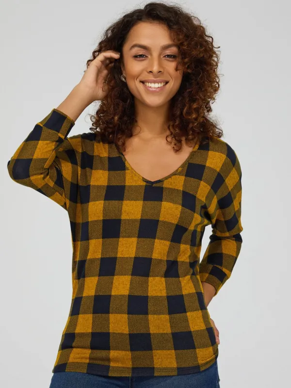 3/4 Dolman Sleeve Plaid Top sold by Suzy Shier