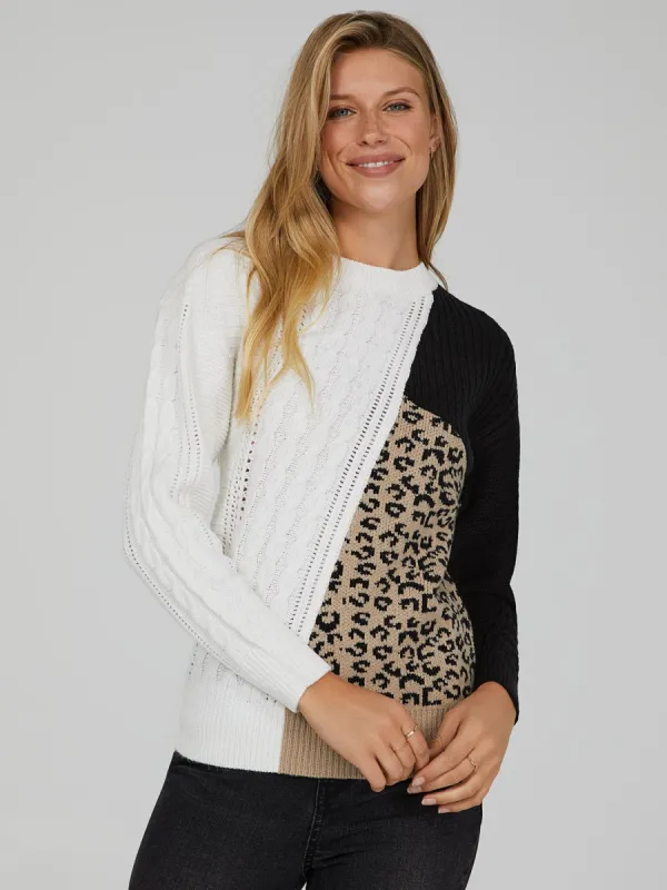 Multi Stitch Patchwork Sweater sold by Suzy Shier